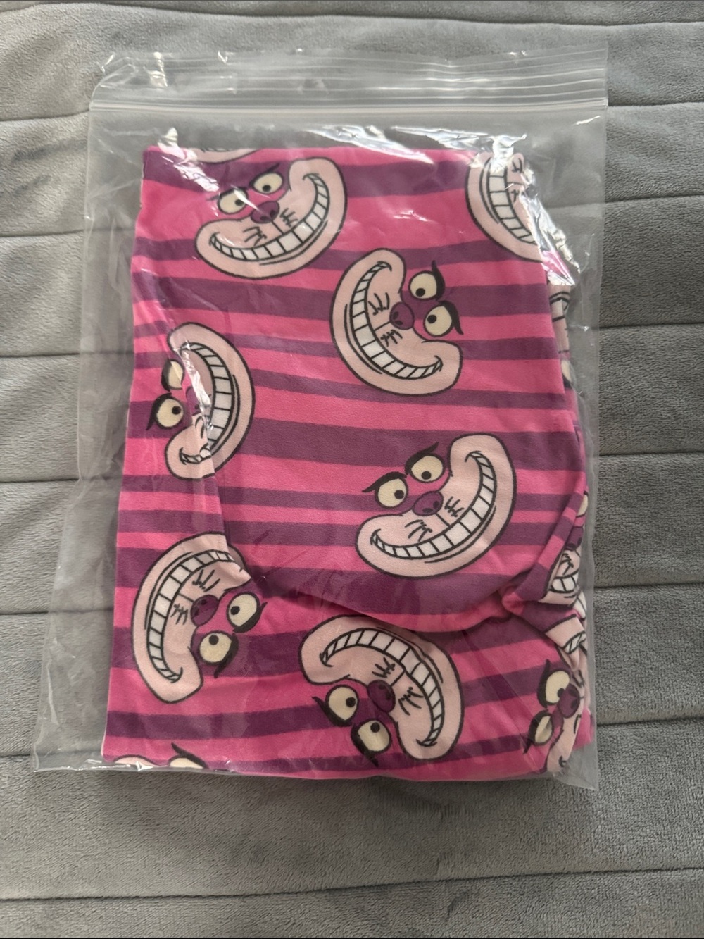LuLaRoe Pink and Purple Striped Cheshire Cat Leggings